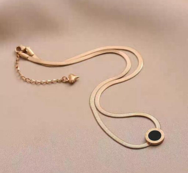 Elegant Dual-Layer Gold Snake Chain Necklace with Black Circular Pendant - Image 3