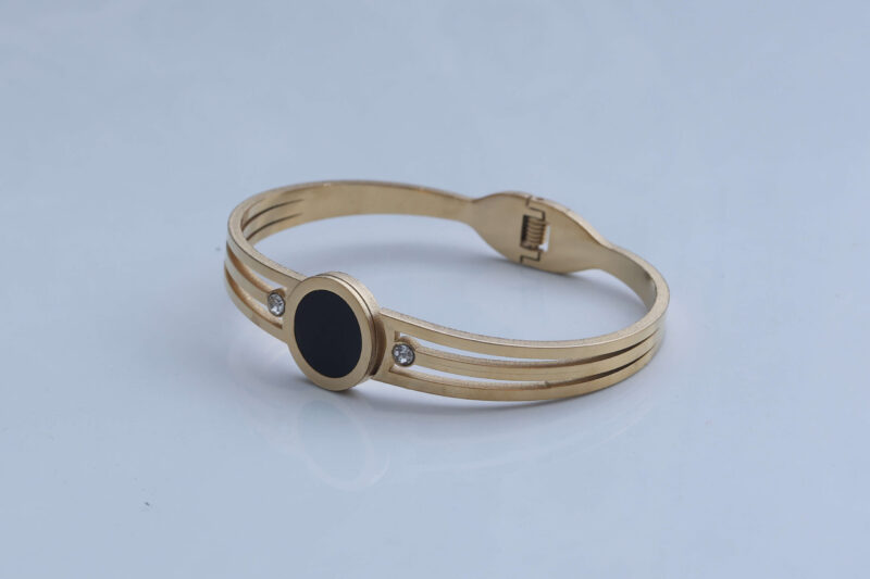 Gold-Tone Triple Band Bangle with Black Disc and Crystal Accents - Image 2
