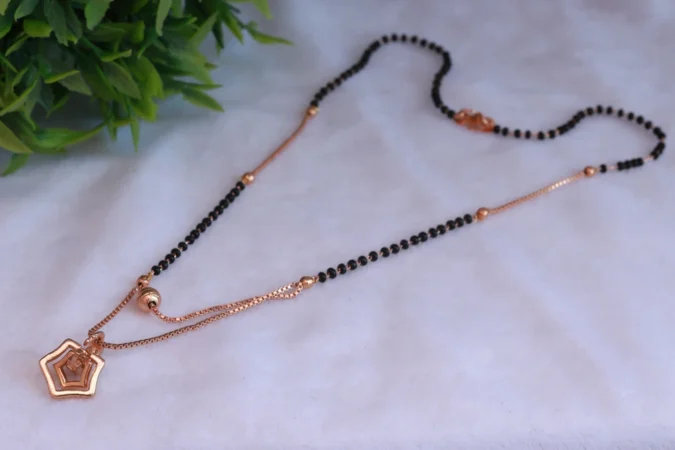 Dual-Chain Rose Gold Plated American Diamond Star-Shaped Pendant