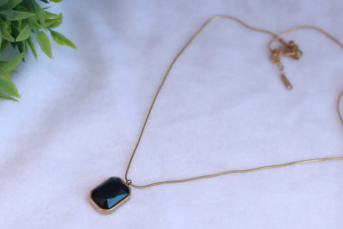 Gold Tone Snake Chain Necklace with Faceted Black Onyx Pendant