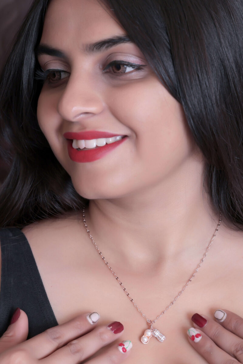 Rose Gold Tone Peanut-Shaped Pendant Necklace with Pearl Accent - Image 3