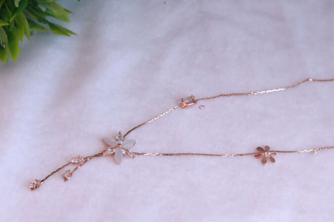Rose Gold Tone Floral Y-Drop Necklace with White Petals and Crystal Dangles