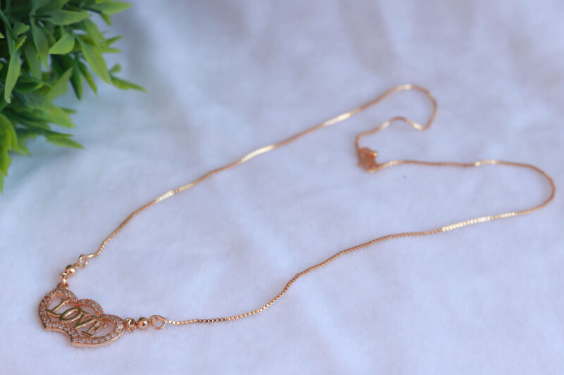 Rose Gold Tone "Love" Pendant Necklace